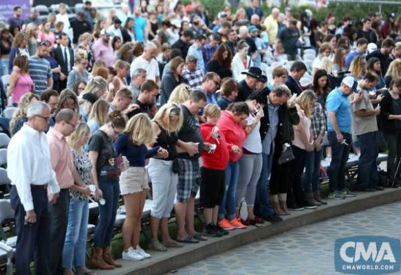 Hundreds of Nashvillians gather inside Ascend Amphitheater Monday during a candlelight vigil in honor of the Las Vegas shooting victims.